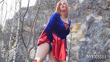 Busty SuperWoman Cosplay outdoor playing and striptease then play with her huge natural boobs and running